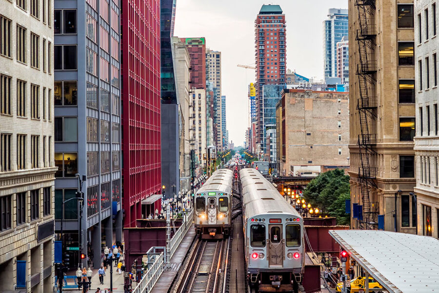 Elevated Train Tracks above the streets and between buildings at The Loop - Chicago, Illinois, USA