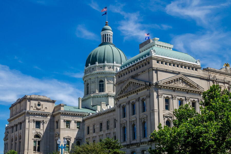 Indiana State House, Indianapolis, in sunlight under a blue sky