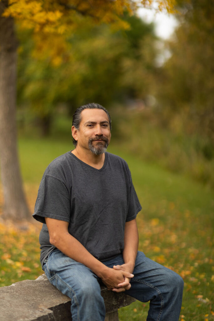 Bail Project client, Trevor, smiling outside