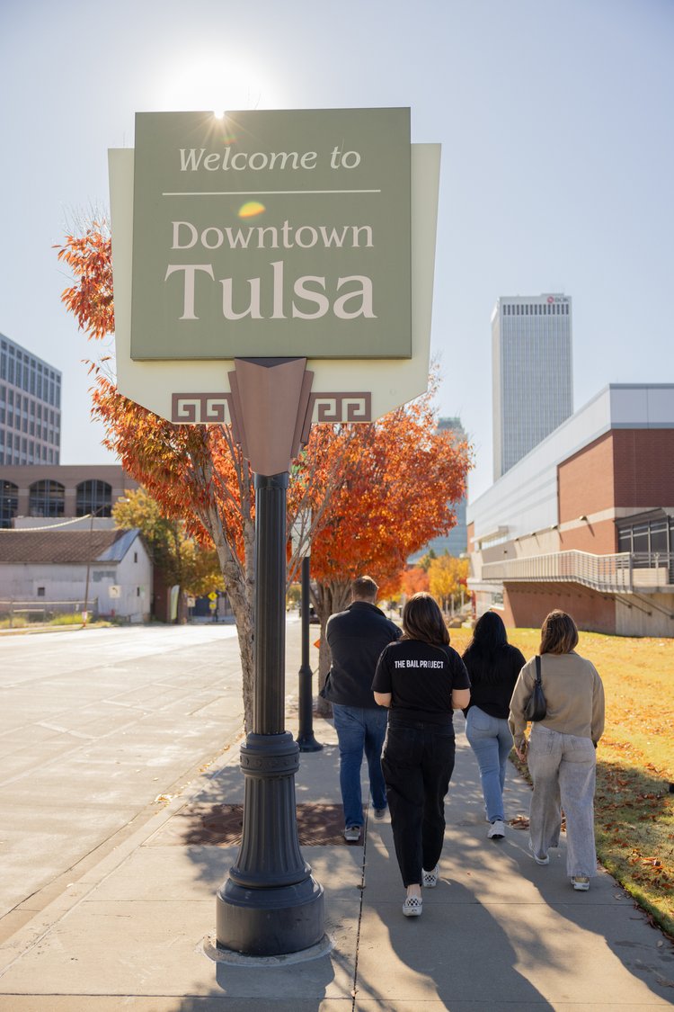 The Bail Project staff members take a walk in downtown Tulsa